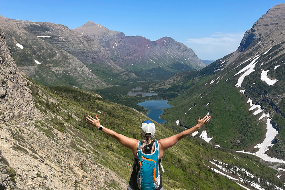 Rikki Barton says there's no view like a mountaintop view. Here, she takes in the vista at Montana's Glacier National Park.