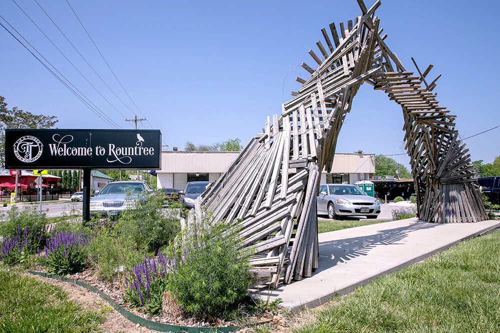 The gate to the Rountree neighborhood is a permanent Sculpture Walk exhibit.