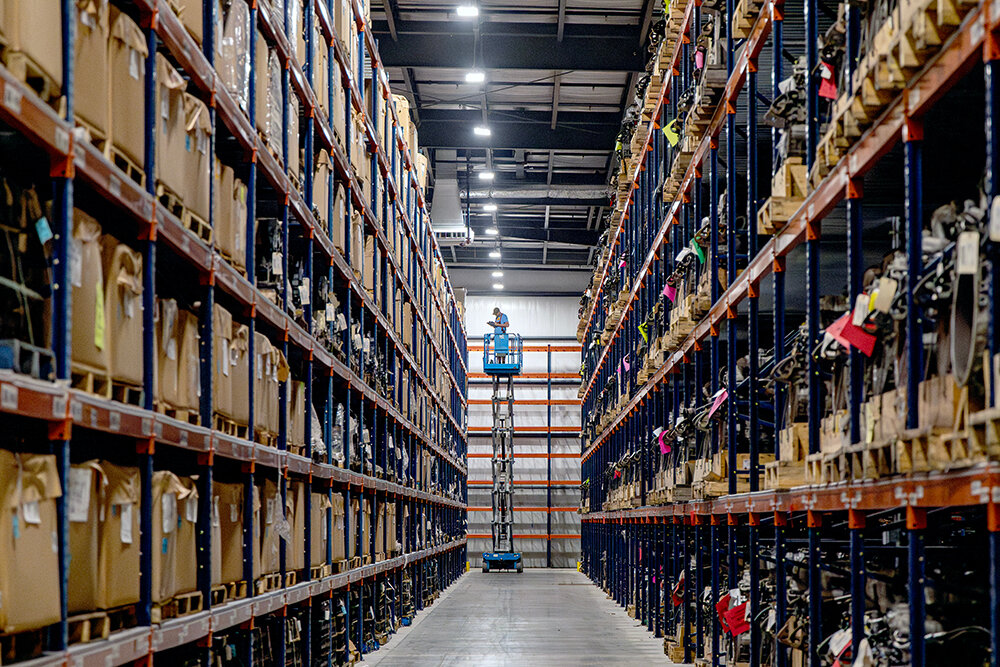 IN STOCK: Incoming and outgoing components for trucks or automotive remanufacturing are carefully organized on enormous pallet racks in SRC Logistics' new facility on North Mulroy Road.
