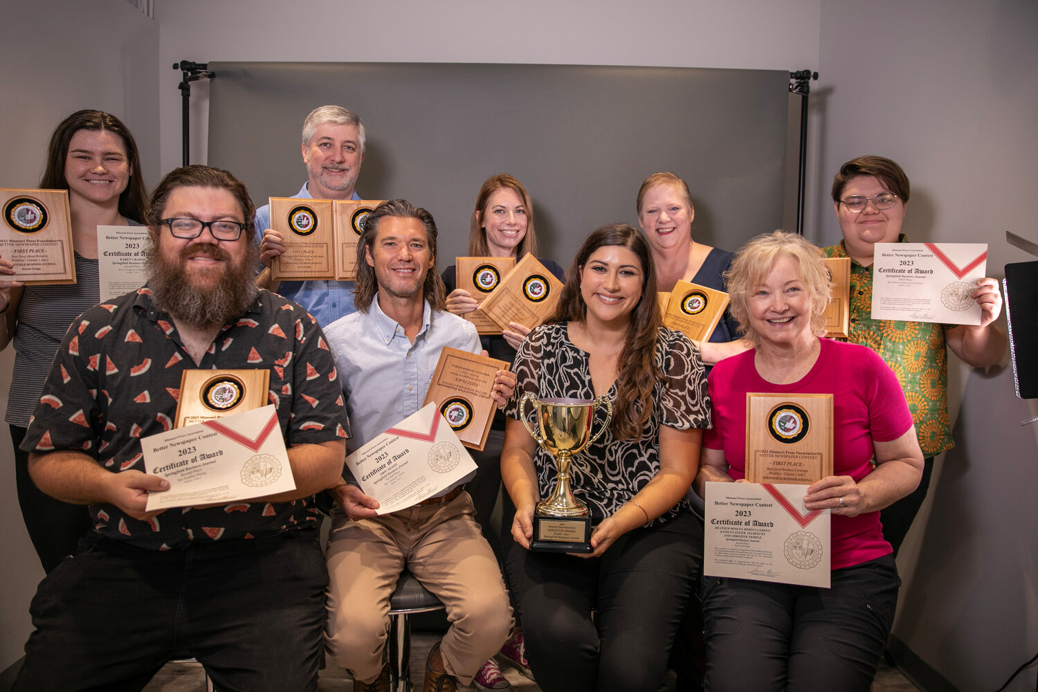 SBJ staff have been presented with 26 awards. Back row: Tawnie Wilson, Mike Cullinan, Rebecca Green, Karen Craigo and Katelyn Egger. Front row: Geoff Pickle, Eric Olson, Christine Temple and Heather Mosley.