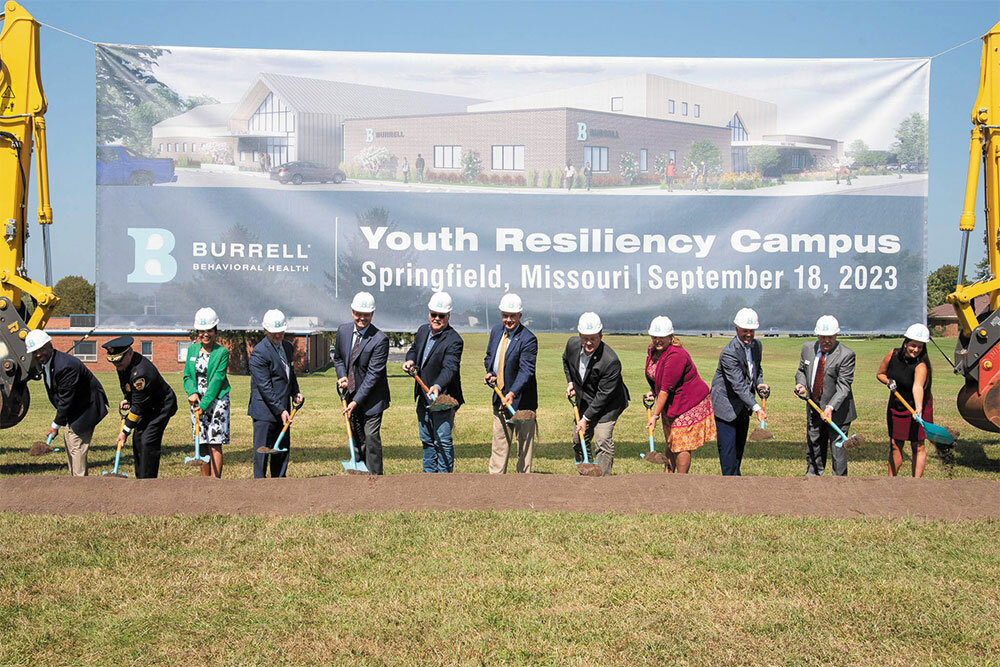 State and local officials took up ceremonial shovels at a Sept. 18 groundbreaking for a Youth Resiliency Campus.