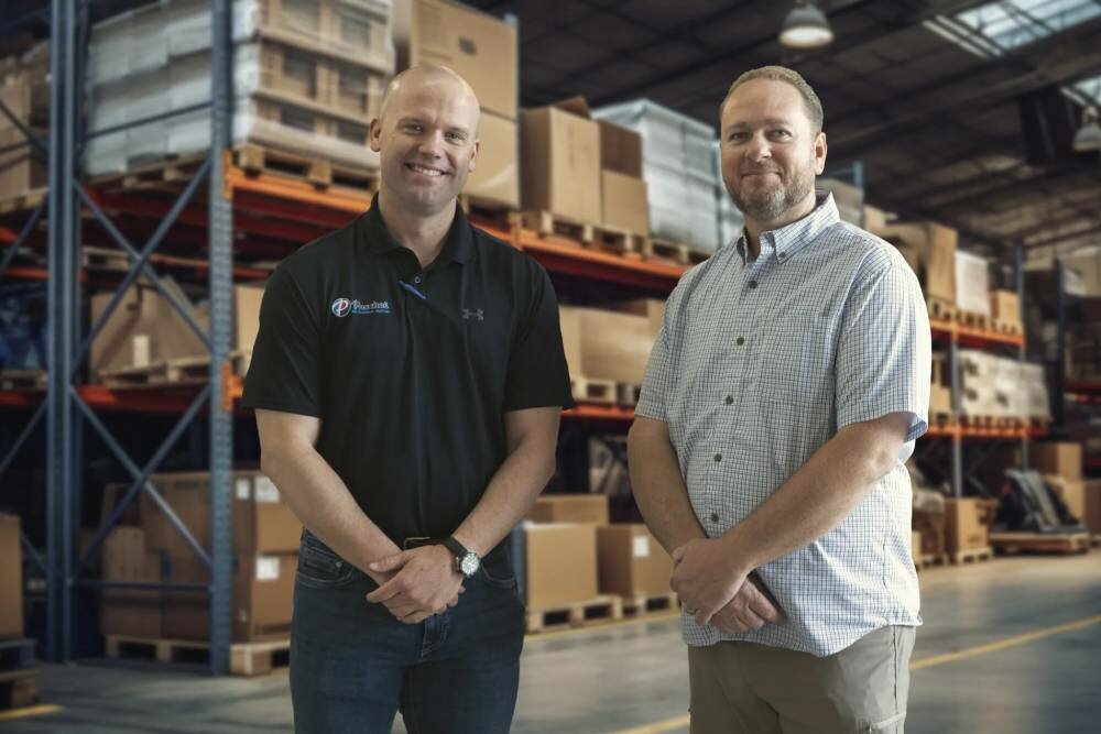 Steve Rook, right, has sold Larson Heating, Air & Plumbing to Paschal Air, Plumbing & Electric, led by President and CEO Charley Boyce.