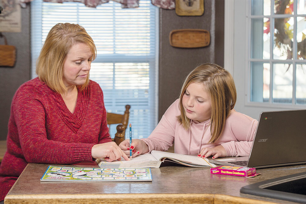 Club Z! In-Home Tutoring Services tutor Gail Breite works one-on-one with a student at home.
