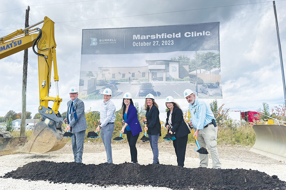 State and Webster County officials join Burrell Behavioral Health representatives at an Oct. 27 groundbreaking for a new Marshfield clinic.