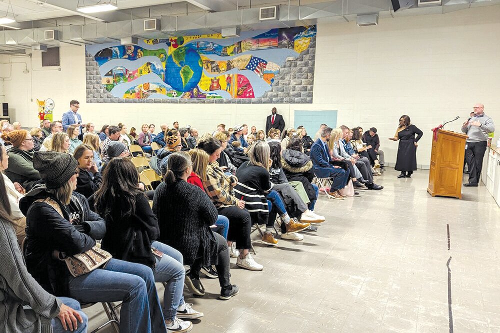 LISTENING SESSION: Superintendent Grenita Lathan answers questions from some 120 community members who gathered a public meeting at Pershing School on Jan. 8.